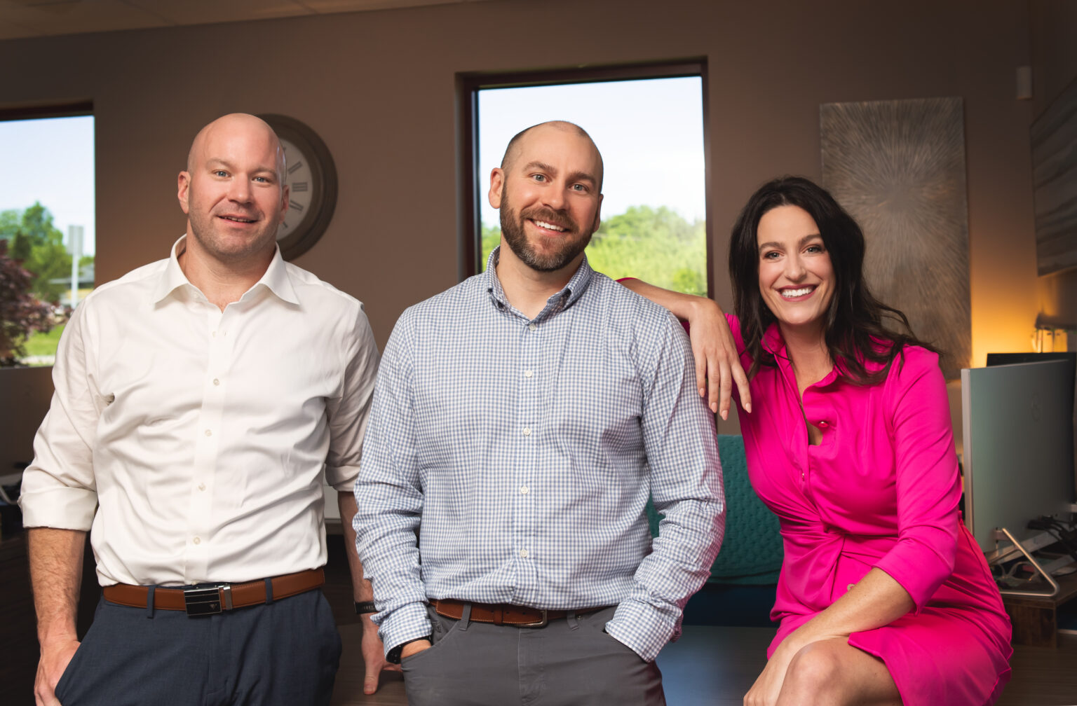 The Steinlage family in their office: Eric, Margo and Karl Steinlage